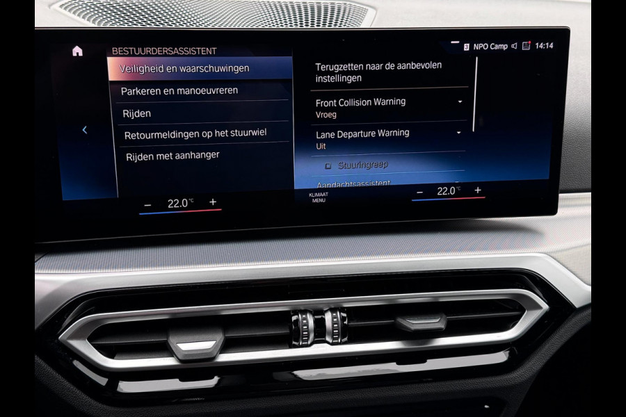 BMW 3 Serie Touring 320e | Trekhaak | SOH 95% | Carplay | Camera | Skyscraper grau | Sfeerverlichting | Widescreen | M Shadow