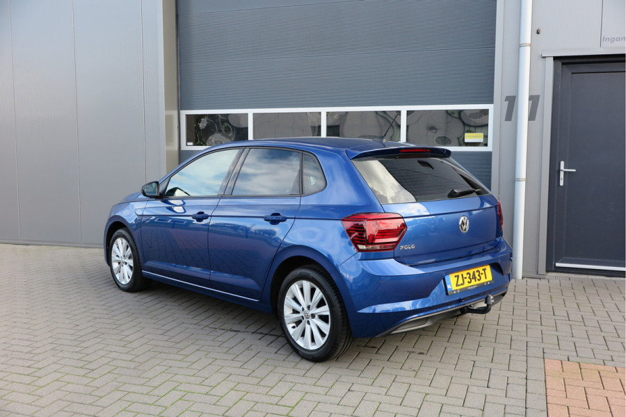 Volkswagen Polo 1.0 TSI 95pk Highline Trekhaak (afneembaar) , Stoelverwarming , PDC, Navi, Carplay, DAB+, Stuurwiel multifuntioneel, Cruisecontrol, Recent onderhouden , historie volledig hier bekend