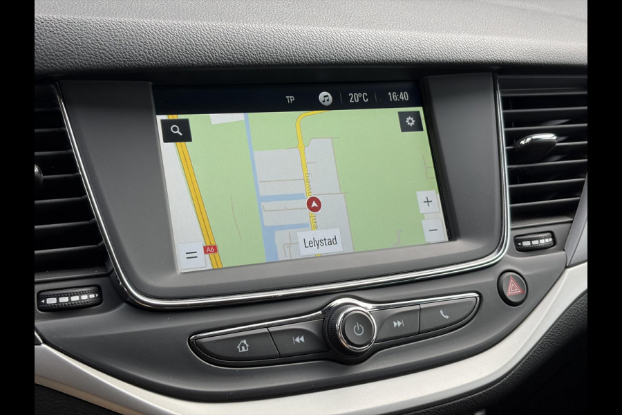 Opel Astra Sports Tourer 1.2 Business Executive ✓1e Eigenaar✓146pk✓Camera✓Trekhaak✓Carplay✓Airco✓Cruise✓Pdc V+A✓Lm velgen✓Comfortstoelen✓6 Bak✓N.A.P✓Nieuwe Apk bij Aflevering