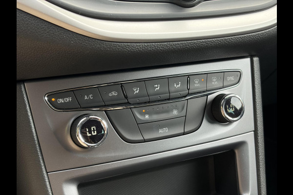 Opel Astra Sports Tourer 1.2 Business Executive ✓1e Eigenaar✓146pk✓Camera✓Trekhaak✓Carplay✓Airco✓Cruise✓Pdc V+A✓Lm velgen✓Comfortstoelen✓6 Bak✓N.A.P✓Nieuwe Apk bij Aflevering