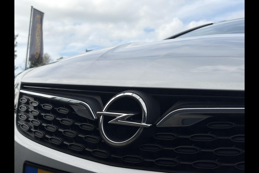 Opel Astra Sports Tourer 1.2 Business Executive ✓1e Eigenaar✓146pk✓Camera✓Trekhaak✓Carplay✓Airco✓Cruise✓Pdc V+A✓Lm velgen✓Comfortstoelen✓6 Bak✓N.A.P✓Nieuwe Apk bij Aflevering