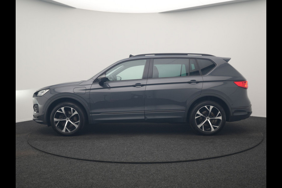 Seat Tarraco 1.4 TSI e-Hybrid FR Business Intense PHEV 245pk Dealer O.H. | Trekhaak Af Fabriek | Panodak | Adaptive Cruise | 360 Camera | Sportstoelen Memory & Verwarmd | Keyless | Blis | Stuur Verwarmd | Apple Carplay | Navigatie | DAB | 19" L.M | Plug In Hybrid