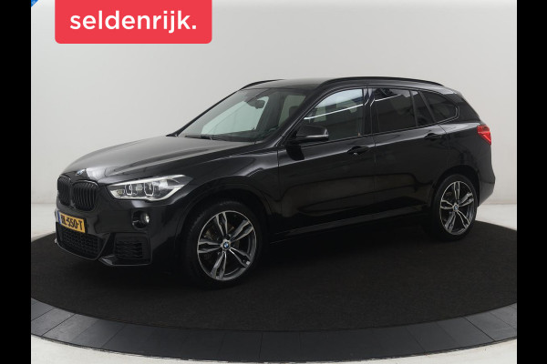 BMW X1 sDrive20i High Executive M-sport | Leder | Memory | Harman/Kardon | Head-up | Cruise control | Stoelverwarming | Climate control | Navigatie | Bluetooth | Park assist | Elektrische achterklep
