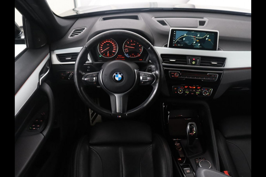 BMW X1 sDrive20i High Executive M-sport | Leder | Memory | Harman/Kardon | Head-up | Cruise control | Stoelverwarming | Climate control | Navigatie | Bluetooth | Park assist | Elektrische achterklep