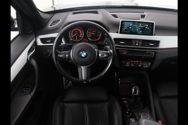 BMW X1 sDrive20i High Executive M-sport | Leder | Memory | Harman/Kardon | Head-up | Cruise control | Stoelverwarming | Climate control | Navigatie | Bluetooth | Park assist | Elektrische achterklep