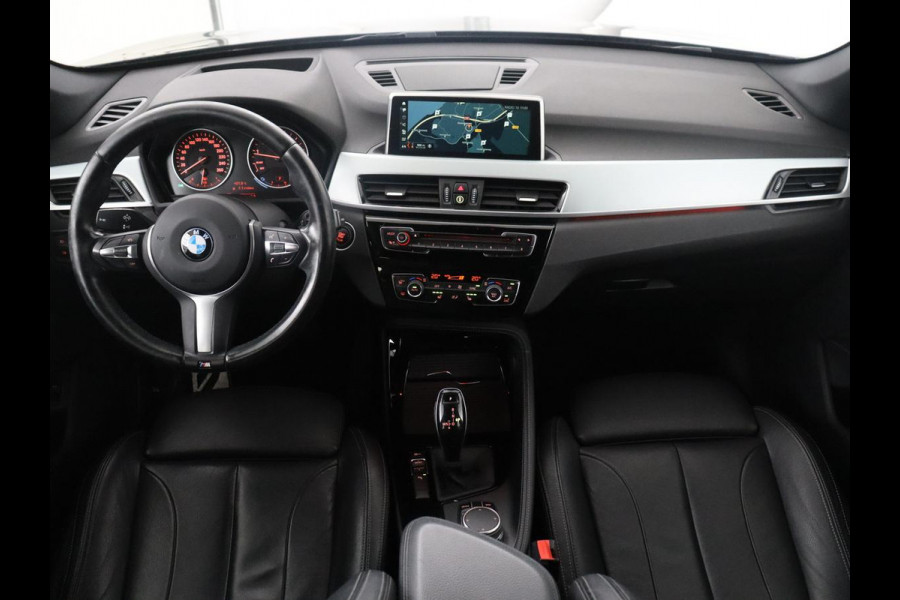 BMW X1 sDrive20i High Executive M-sport | Leder | Memory | Harman/Kardon | Head-up | Cruise control | Stoelverwarming | Climate control | Navigatie | Bluetooth | Park assist | Elektrische achterklep