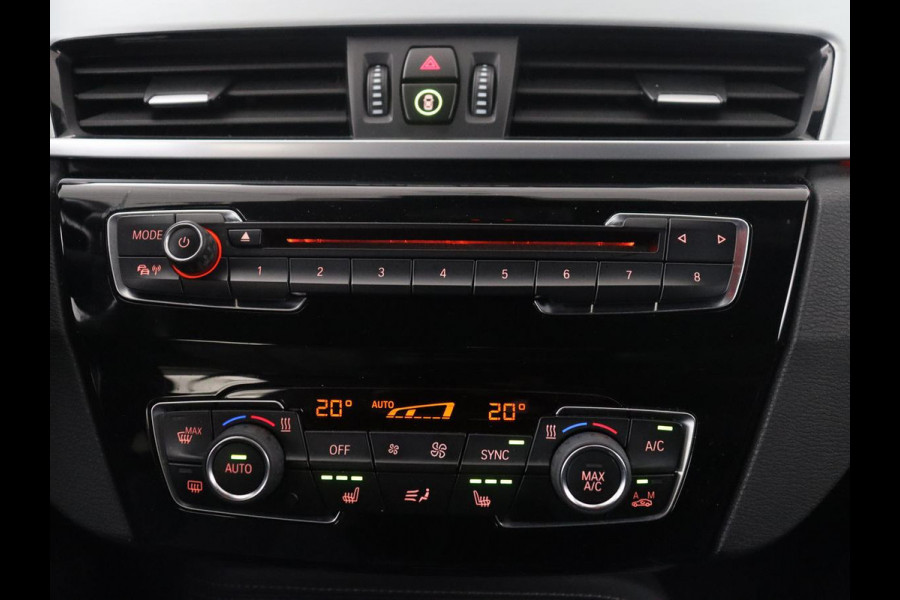 BMW X1 sDrive20i High Executive M-sport | Leder | Memory | Harman/Kardon | Head-up | Cruise control | Stoelverwarming | Climate control | Navigatie | Bluetooth | Park assist | Elektrische achterklep
