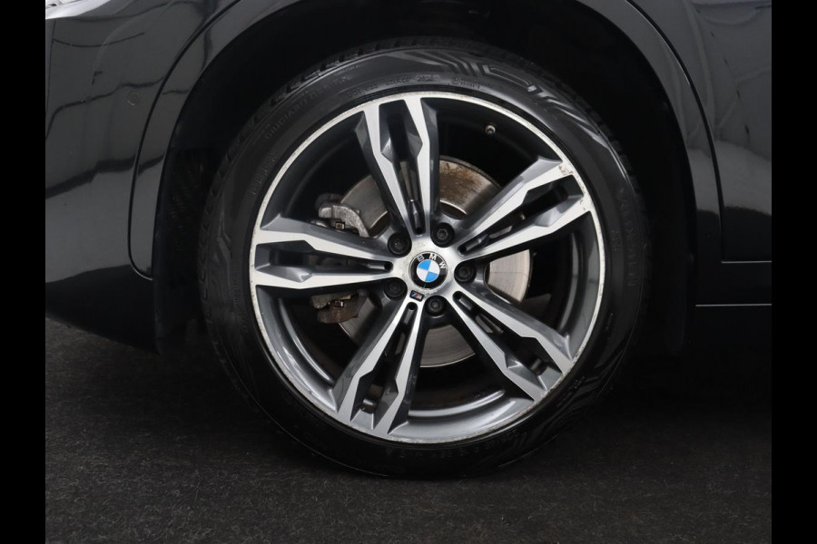 BMW X1 sDrive20i High Executive M-sport | Leder | Memory | Harman/Kardon | Head-up | Cruise control | Stoelverwarming | Climate control | Navigatie | Bluetooth | Park assist | Elektrische achterklep