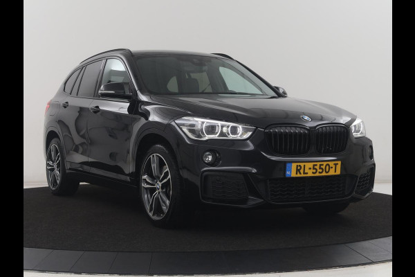 BMW X1 sDrive20i High Executive M-sport | Leder | Memory | Harman/Kardon | Head-up | Cruise control | Stoelverwarming | Climate control | Navigatie | Bluetooth | Park assist | Elektrische achterklep