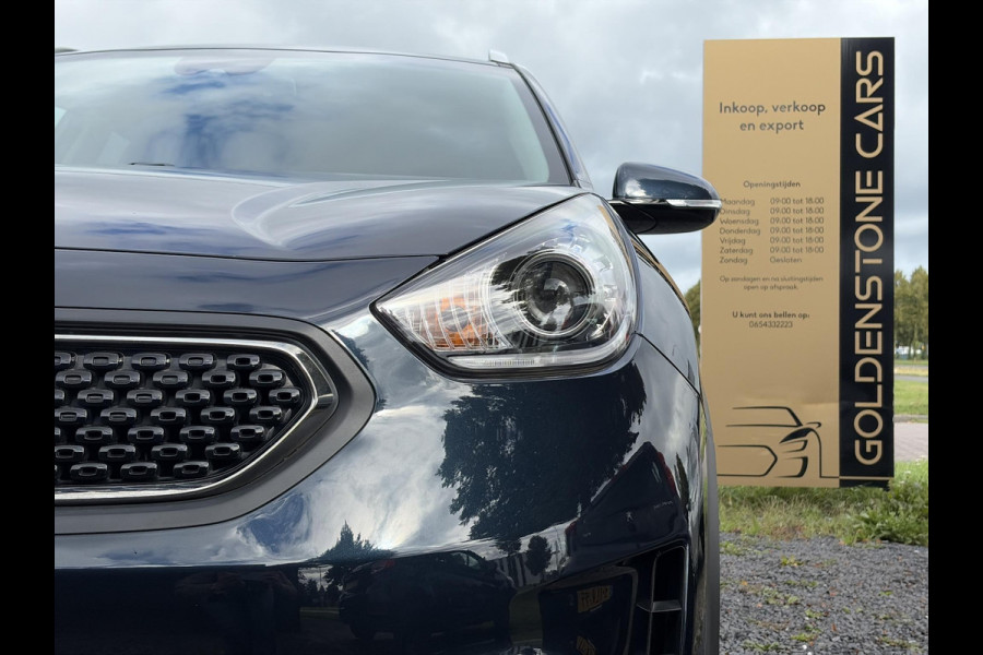Kia Niro 1.6 GDi Hybrid ExecutiveLine ✓1e Eigenaar✓Trekhaak✓Draadloze telefoonlader✓Camera✓Stoelverw✓Stuurverw✓Stoelverkoeling✓Keyless✓Carplay✓Navi✓Clima✓Cruise✓Leder✓Pdc V+A✓Dodehoeksensor✓18''Lm velgen✓Memorystoelen✓N.A.P✓Apk tot 07-2027