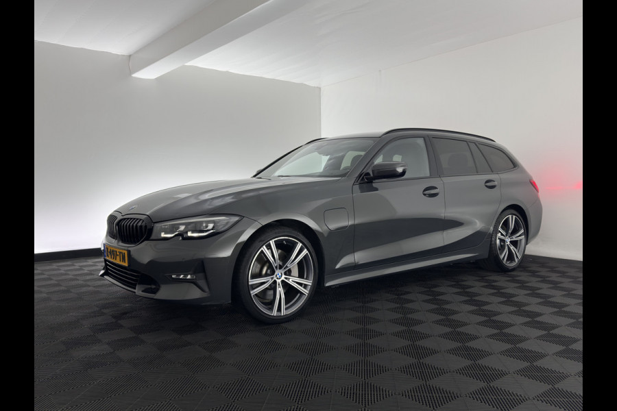BMW 3 Serie Touring 330e Sportline High Executive (Plug-in) {SoH-91%} (INCL-BTW) Aut. *LEATHER | FULL-LED | HEATED-SPORTSEATS | HIFI-SOUND | NAVI-FULLMAP | DAB+ | DIGI-COCKPIT | PRIVACY-GLASS | AMBIENTLIGHT | ECC | PDC | CRUISE | SHIFT-PADDLES | 19"ALU*