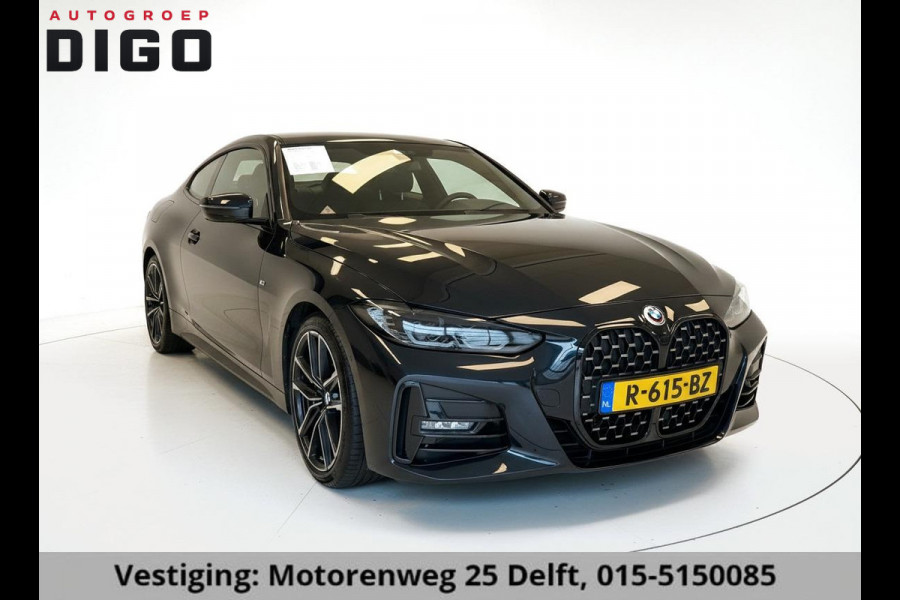 BMW 4 Serie Coupé 420i High Executive M-Pakket GARANTIE TOT 07-2032* . PANORAMA-DAK . PARKEERSENSOREN VOOR & ACHTER . STOELVERWARMING . 1E EIGENAAR! .