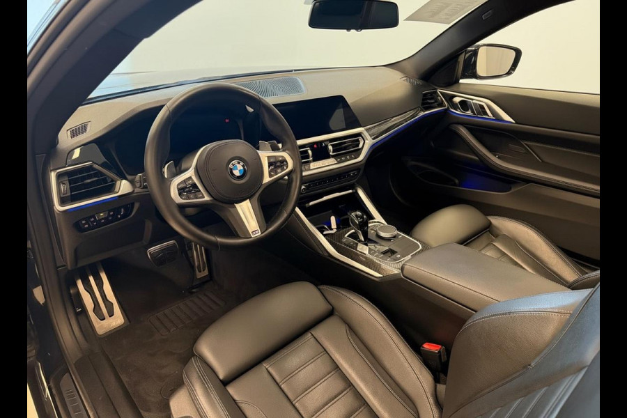 BMW 4 Serie Coupé 420i High Executive M-Pakket GARANTIE TOT 07-2032* . PANORAMA-DAK . PARKEERSENSOREN VOOR & ACHTER . STOELVERWARMING . 1E EIGENAAR! .