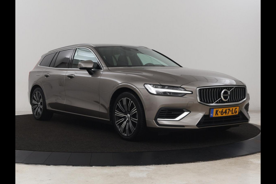 Volvo V60 2.0 T6 Recharge AWD Inscription | Trekhaak | SOH 81% | Stoelverwarming | Harman/Kardon | Leder | Camera | Adaptive cruise | Carplay | Keyless | Memory | Navigatie | Full LED | Stuurverwarming | PHEV | Plug in
