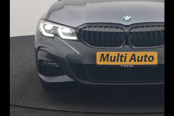 BMW 3 Serie Touring 330e xDrive M Sport PHEV 293pk Dealer O.H. | Panodak | Trekhaak Af Fabriek | Laser LED | Lederen Sportstoelen Memory & Verwarmd | Camera | Apple Carplay | Stuur Verwarmd | Blis | Adaptief Onderstel | Sfeerverlichting | 19"L.M | DAB | Plug In Hybrid |