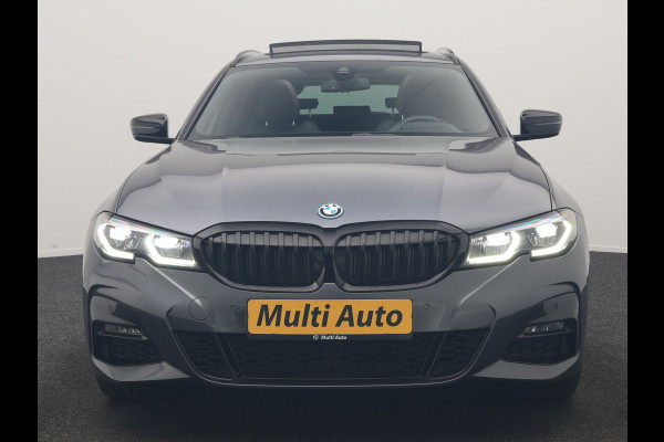 BMW 3 Serie Touring 330e xDrive M Sport PHEV 293pk Dealer O.H. | Panodak | Trekhaak Af Fabriek | Laser LED | Lederen Sportstoelen Memory & Verwarmd | Camera | Apple Carplay | Stuur Verwarmd | Blis | Adaptief Onderstel | Sfeerverlichting | 19"L.M | DAB | Plug In Hybrid |