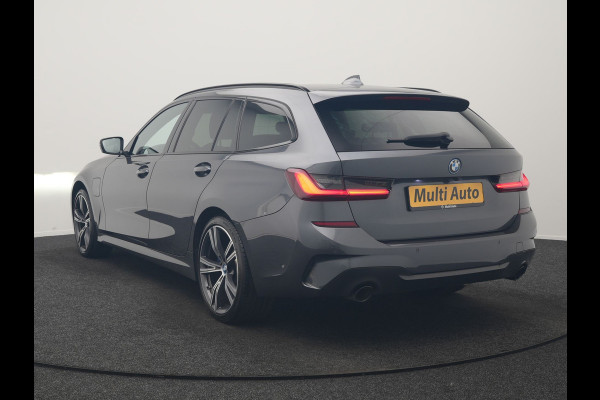 BMW 3 Serie Touring 330e xDrive M Sport PHEV 293pk Dealer O.H. | Panodak | Trekhaak Af Fabriek | Laser LED | Lederen Sportstoelen Memory & Verwarmd | Camera | Apple Carplay | Stuur Verwarmd | Blis | Adaptief Onderstel | Sfeerverlichting | 19"L.M | DAB | Plug In Hybrid |