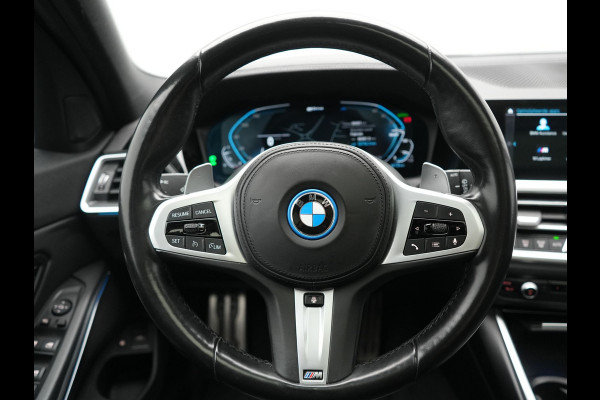 BMW 3 Serie Touring 330e xDrive M Sport PHEV 293pk Dealer O.H. | Panodak | Trekhaak Af Fabriek | Laser LED | Lederen Sportstoelen Memory & Verwarmd | Camera | Apple Carplay | Stuur Verwarmd | Blis | Adaptief Onderstel | Sfeerverlichting | 19"L.M | DAB | Plug In Hybrid |