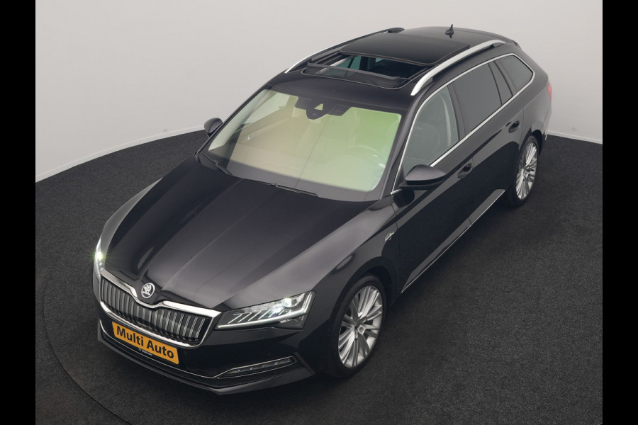 Škoda Superb Combi 1.4 TSI iV Laurin & Klement PHEV 218pk Dealer O.H. | Trekhaak Af Fabriek | Panodak | Adaptive Cruise | 360 Camera | Lederen Comfortstoelen Memory & Ventilatie | Canton Audio | Crystal LED | Stoelen & Stuur Verwarmd | Apple Carplay | Blis | DAB | Navigatie | 19"L.M | Plug In Hybrid |