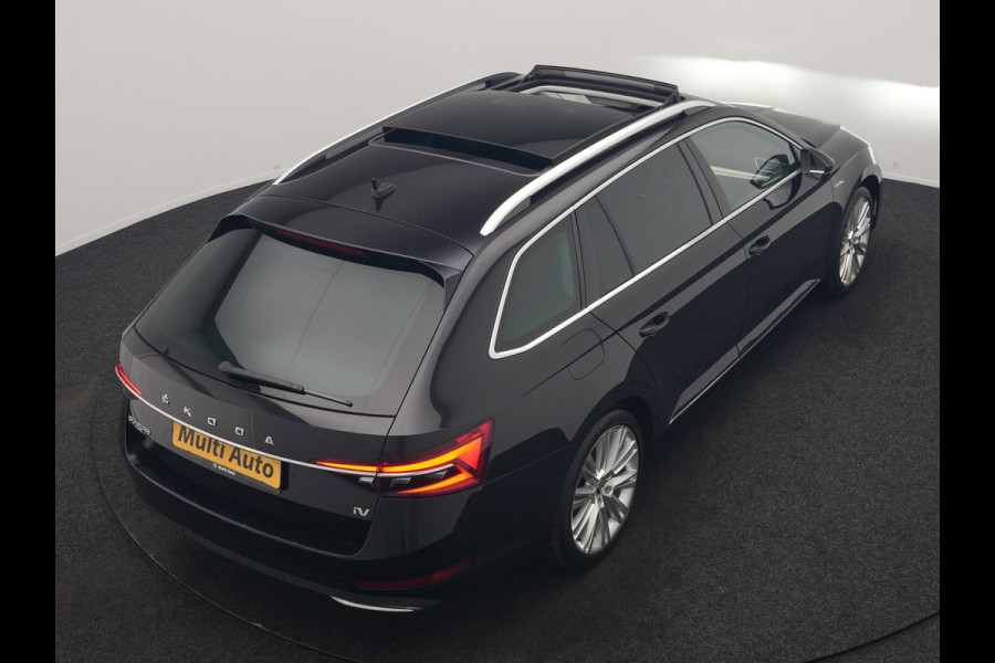 Škoda Superb Combi 1.4 TSI iV Laurin & Klement PHEV 218pk Dealer O.H. | Trekhaak Af Fabriek | Panodak | Adaptive Cruise | 360 Camera | Lederen Comfortstoelen Memory & Ventilatie | Canton Audio | Crystal LED | Stoelen & Stuur Verwarmd | Apple Carplay | Blis | DAB | Navigatie | 19"L.M | Plug In Hybrid |