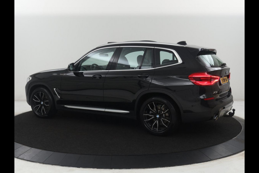 BMW X3 xDrive20i | Trekhaak | Panoramadak | Adaptive cruise | Half Leder | Head-up | Camera | Sfeerverlichting | Climate control | Stoelverwarming | Full LED |