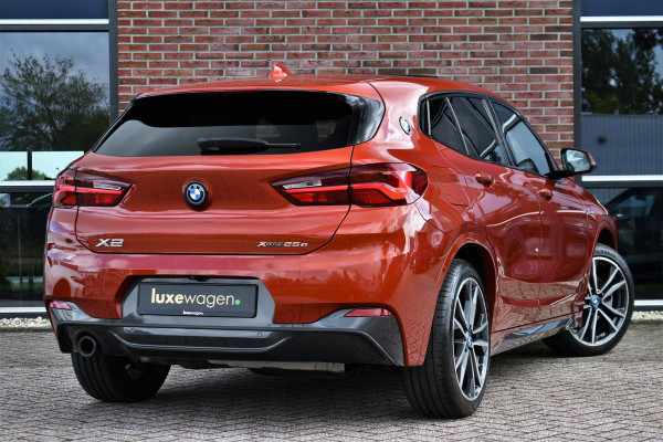 BMW X2 xDrive25e M-Sport | Pano | HUD | Sunset orange | 19 inch | Camera