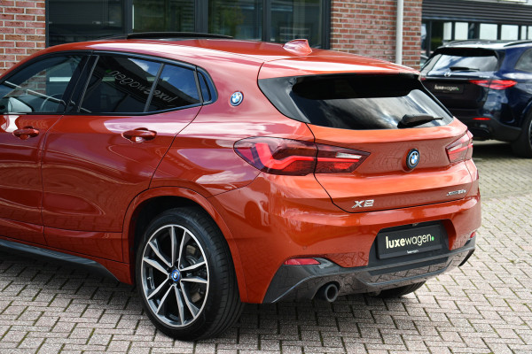 BMW X2 xDrive25e M-Sport | Pano | HUD | Sunset orange | 19 inch | Camera
