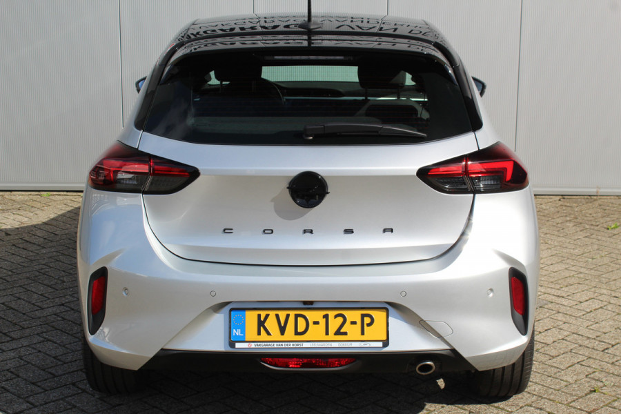 Opel Corsa 1.2-100pk Turbo Ultimate. In nieuwstaat verkerende Opel Corsa ! Autm. airco, cruise cntrl, lane assist, panoramadak, verwarmde stoelen, LM wielen, camera, pdc v+a, navigatie by Apple Carplay/Android auto, metallic, LED verl. etc.