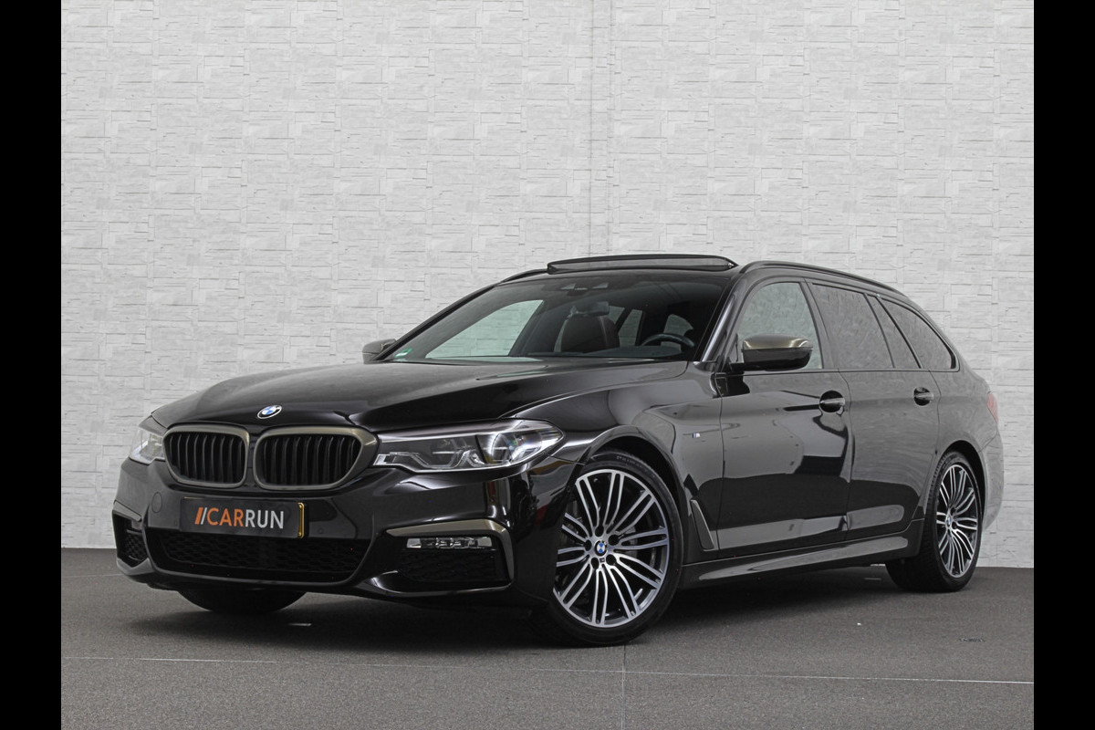 BMW 5 Serie Touring 520i M-Sport Volledig Individual | Nappa | Comfortseats | Panodak | Trekhaak 2000kg | Adapt. Led | Luchtvering niveauregeling | Display Key | Camera | Memory | 19" | Nav. Proffesional | Alarm | NL-Auto | Dealer OH | NAP | Full Service - Rijklaarprijs.
