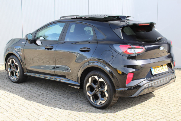 Ford Puma 1.0-125pk EcoBoost Mild-Hybrid ST-Line X. Fabr. garantie t/m 13-11-2029 ! Slechts 4.000km ! Autm. airco, adapt. cruise cntrl, navigatie, telefoonvoorb., elektr. pano-dak, stoel-, stuur- en voorraamverw., side- en lane assist, LED verl. etc.