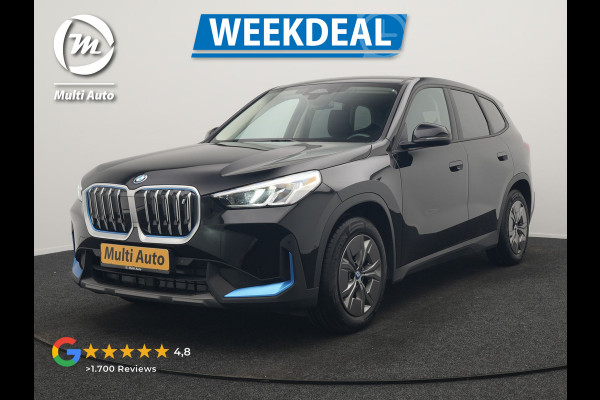 BMW iX1 xDrive30 67 kWh 313pk Dealer O.H. | Adaptief M Onderstel | Camera | Cruise Control | Stoelverwarming | Widescreen Navi | Park Assist | Apple Carplay | Navigatie | DAB | Standkachel |