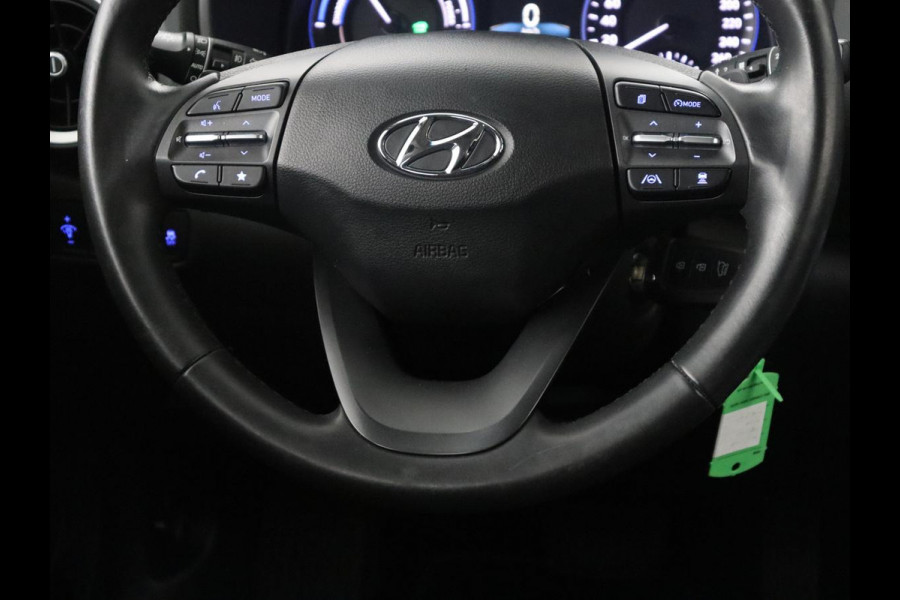 Hyundai Kona 1.6 GDI HEV Comfort Smart | Trekhaak | Adaptive cruise | Camera | Carplay | KRELL sound | Full LED | Park assist | Climate control | Navigatie |