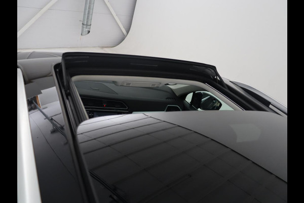 Volkswagen Tiguan 1.4 TSI Comfortline Business | Adapt. Cruise | Stoelverwarming | Navigatie | Pano.Dak |