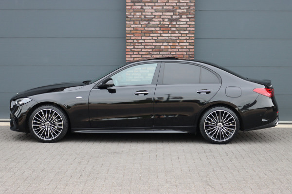 Mercedes-Benz C-Klasse 400 e 4MATIC AMG Line | Distronic+ | Panoramadak | Nappa Leder | Burmester | Memory | Digital Light | HUD | Verwarmd Stuurwiel | Keyless Go | Surround Camera |