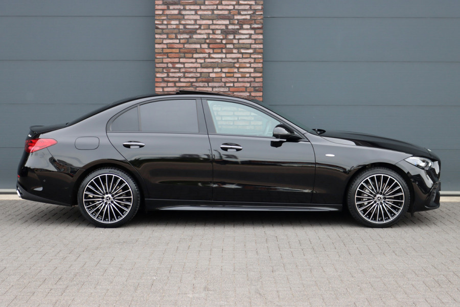 Mercedes-Benz C-Klasse 400 e 4MATIC AMG Line | Distronic+ | Panoramadak | Nappa Leder | Burmester | Memory | Digital Light | HUD | Verwarmd Stuurwiel | Keyless Go | Surround Camera |