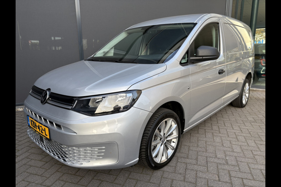 Volkswagen Caddy Cargo Maxi 2.0 TDI Comfort Airco - Apple carplay - Parkeersensor achter - Zijschuifdeur rechts - Tussenschot volledig - Zijwandbekleding laadruimte - Cruise control - Bluetooth - Start/stop systeem - Elektrische ramen - Stuur multifunctioneel - Regensensor