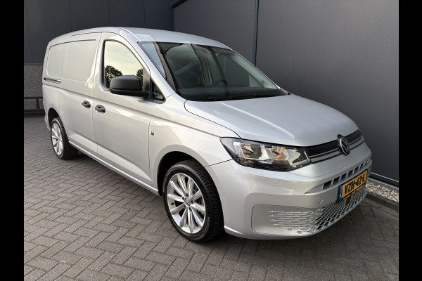 Volkswagen Caddy Cargo Maxi 2.0 TDI Comfort Airco - Apple carplay - Parkeersensor achter - Zijschuifdeur rechts - Tussenschot volledig - Zijwandbekleding laadruimte - Cruise control - Bluetooth - Start/stop systeem - Elektrische ramen - Stuur multifunctioneel - Regensensor