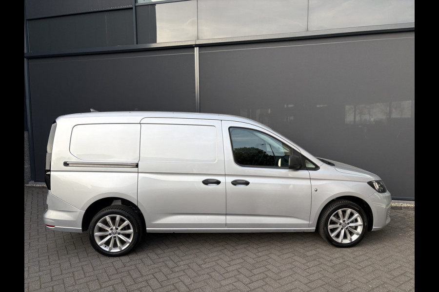 Volkswagen Caddy Cargo Maxi 2.0 TDI Comfort Airco - Apple carplay - Parkeersensor achter - Zijschuifdeur rechts - Tussenschot volledig - Zijwandbekleding laadruimte - Cruise control - Bluetooth - Start/stop systeem - Elektrische ramen - Stuur multifunctioneel - Regensensor