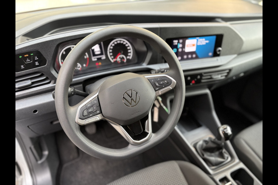 Volkswagen Caddy Cargo Maxi 2.0 TDI Comfort Airco - Apple carplay - Parkeersensor achter - Zijschuifdeur rechts - Tussenschot volledig - Zijwandbekleding laadruimte - Cruise control - Bluetooth - Start/stop systeem - Elektrische ramen - Stuur multifunctioneel - Regensensor