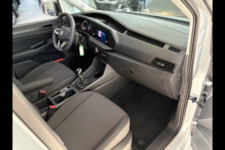 Volkswagen Caddy Cargo Maxi 2.0 TDI Comfort Airco - Apple carplay - Parkeersensor achter - Zijschuifdeur rechts - Tussenschot volledig - Zijwandbekleding laadruimte - Cruise control - Bluetooth - Start/stop systeem - Elektrische ramen - Stuur multifunctioneel - Regensensor