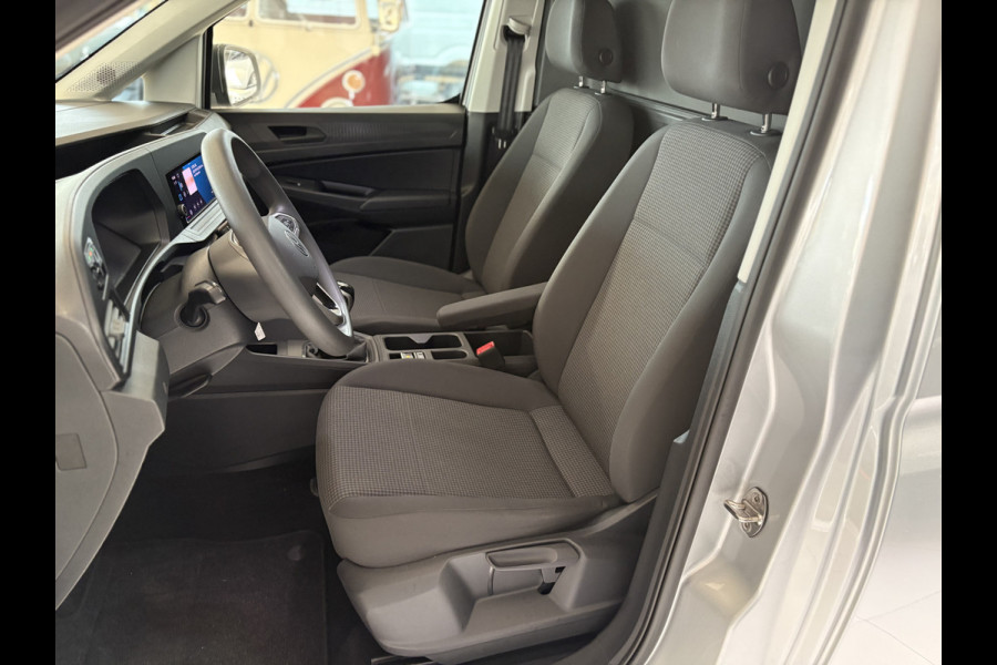 Volkswagen Caddy Cargo Maxi 2.0 TDI Comfort Airco - Apple carplay - Parkeersensor achter - Zijschuifdeur rechts - Tussenschot volledig - Zijwandbekleding laadruimte - Cruise control - Bluetooth - Start/stop systeem - Elektrische ramen - Stuur multifunctioneel - Regensensor