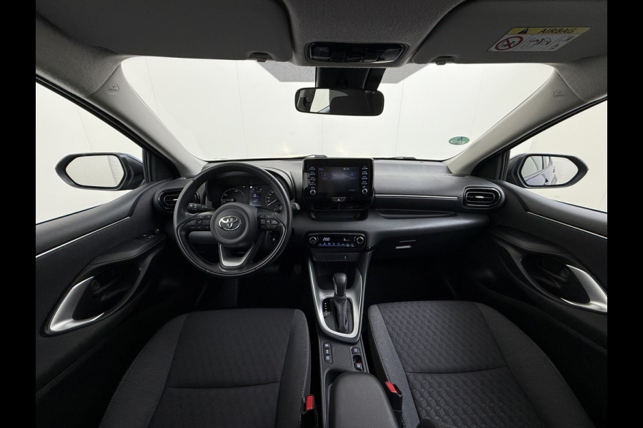 Toyota Yaris 1.5 Hybrid Automaat Camera Adap.Cruise Apple Carplay Android Auto Navi* Ecc Bluetooth Active Regen-Lichtsensor Isofix LTA Stuurhulp Wifi Miracast PCS RSA DRCC 1e Eigenaar