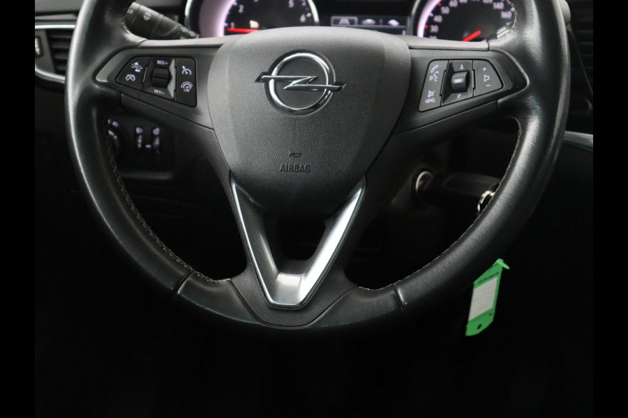 Opel Astra Sports Tourer 1.2 Design & Tech | Cruise control | Camera | Park assist | Trekhaak | Dodehoek detectie | Navigatie | Carplay | Climate control | 16" velgen