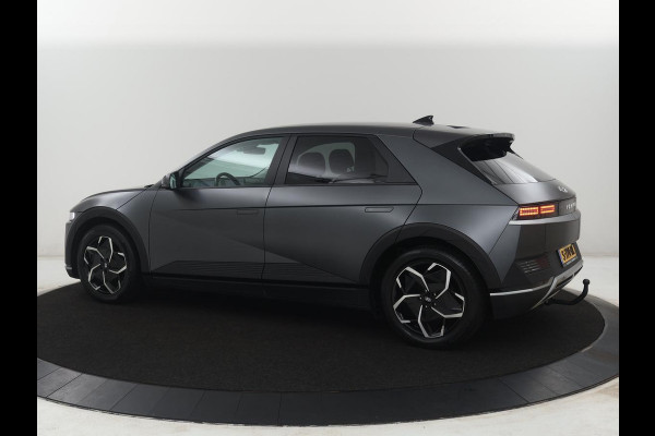 Hyundai IONIQ 5 Connect 77.4 kWh | SOH 94,1% | Half leder | Stuur/stoel verwarming Adaptive cruise | Trekhaak | BOSE sound | Camera | Park assist | Carplay | Climate control | Full LED