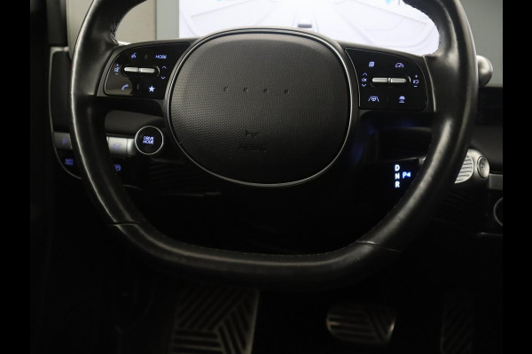 Hyundai IONIQ 5 Connect 77.4 kWh | SOH 94,1% | Half leder | Stuur/stoel verwarming Adaptive cruise | Trekhaak | BOSE sound | Camera | Park assist | Carplay | Climate control | Full LED