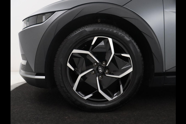 Hyundai IONIQ 5 Connect 77.4 kWh | SOH 94,1% | Half leder | Stuur/stoel verwarming Adaptive cruise | Trekhaak | BOSE sound | Camera | Park assist | Carplay | Climate control | Full LED