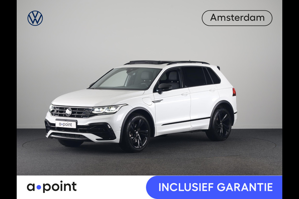 Volkswagen Tiguan 1.4 TSI eHybrid R-Line Business 245 pk Automaat (DSG) | Navigatie | Panoramadak | Parkeersensoren (Park assist) | Rondomzicht camera | Lederen bekleding | Elektr. voorstoelen met geheugen | Black Style pakket | R-Line |