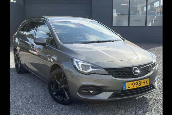 Opel Astra Sports Tourer 1.2 Ultimate ✓146pk✓Carplay✓Camera✓Stoelverw✓Stuurverw✓Keyless✓Pdc V+A✓Alcantara-Leder✓Clima✓Cruise✓6 Bak✓Rijstrooksensor✓Dodehoeksensor✓17''Lm velgen✓N.A.P✓Apk tot 11-2028