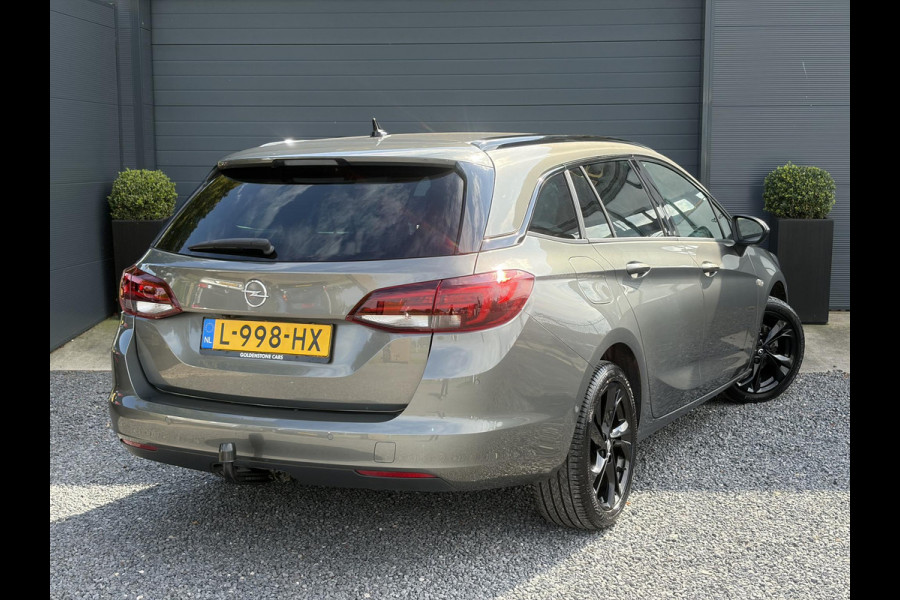 Opel Astra Sports Tourer 1.2 Ultimate ✓146pk✓Carplay✓Camera✓Stoelverw✓Stuurverw✓Keyless✓Pdc V+A✓Alcantara-Leder✓Clima✓Cruise✓6 Bak✓Rijstrooksensor✓Dodehoeksensor✓17''Lm velgen✓N.A.P✓Apk tot 11-2028