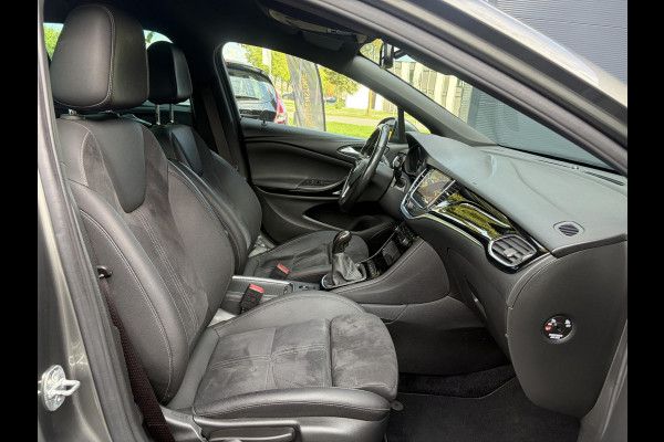 Opel Astra Sports Tourer 1.2 Ultimate ✓146pk✓Carplay✓Camera✓Stoelverw✓Stuurverw✓Keyless✓Pdc V+A✓Alcantara-Leder✓Clima✓Cruise✓6 Bak✓Rijstrooksensor✓Dodehoeksensor✓17''Lm velgen✓N.A.P✓Apk tot 11-2028